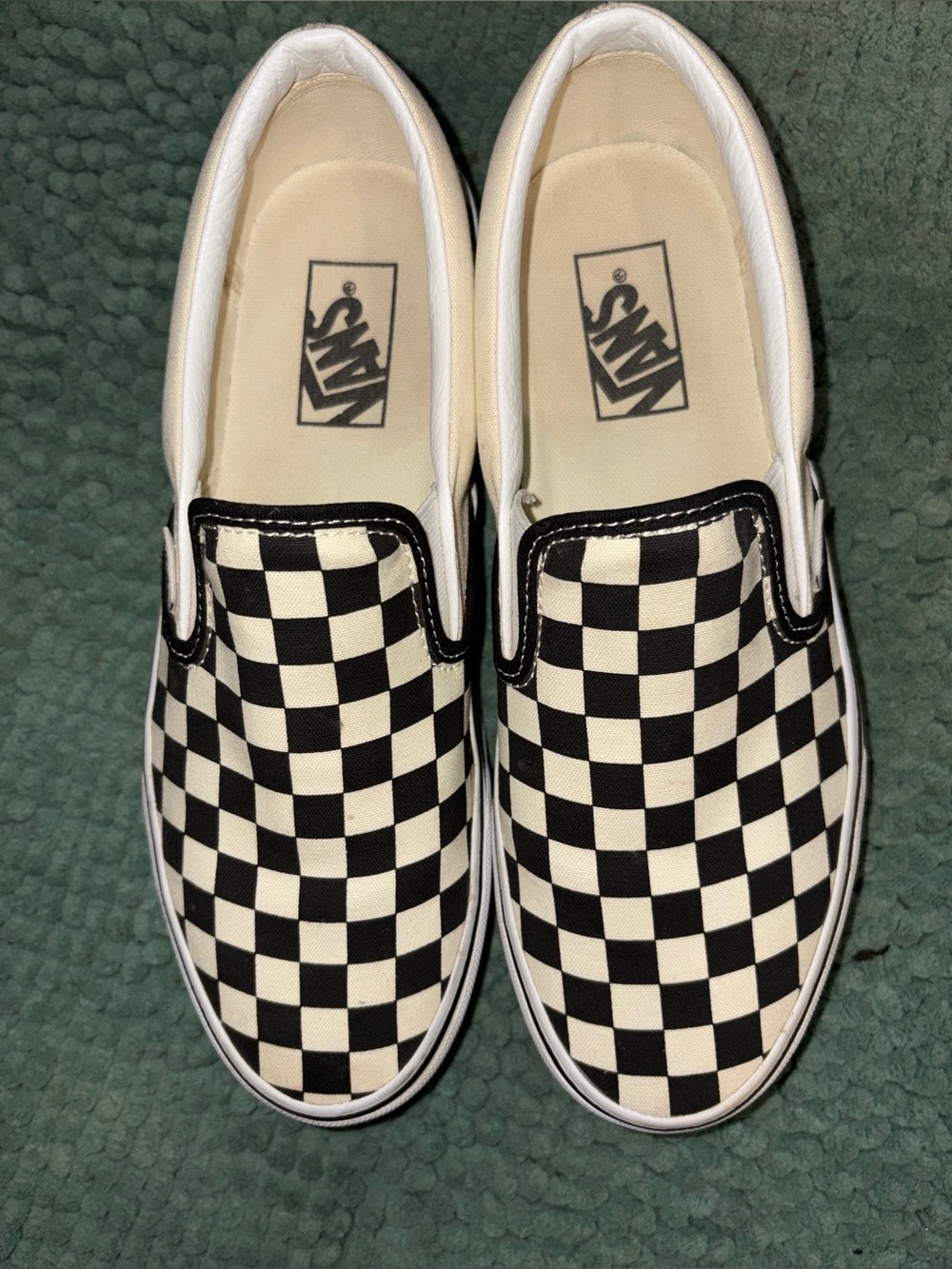 Vans Checkerboard platform Slip-On Sneakers in Black and White